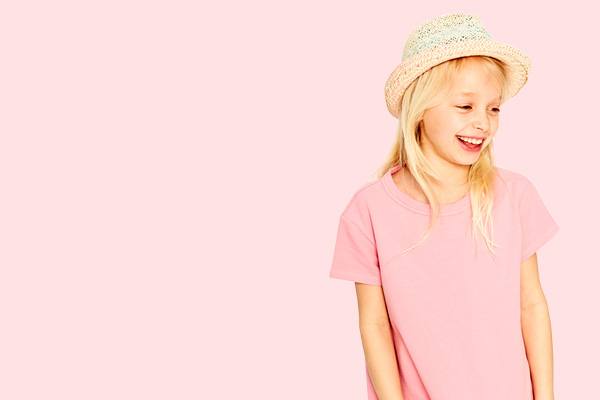 pink youth v-neck t-shirt with left-chest blank area front view on smiling girl model in straw hat