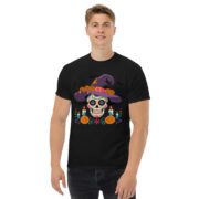 Unisex black classic crewneck t-shirt with colorful sugar skull witch graphic centered on front, male model front view