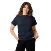 Unisex navy classic tee with small red KraftyBliss crest on left chest and maple leaf back logo, front view model